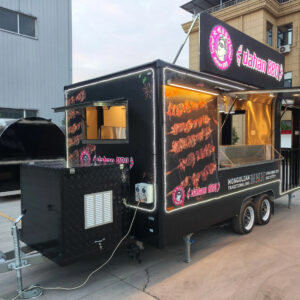 Rear exterior of a BBQ concession trailer for sale, showcasing access panels by Luxe Custom Co.