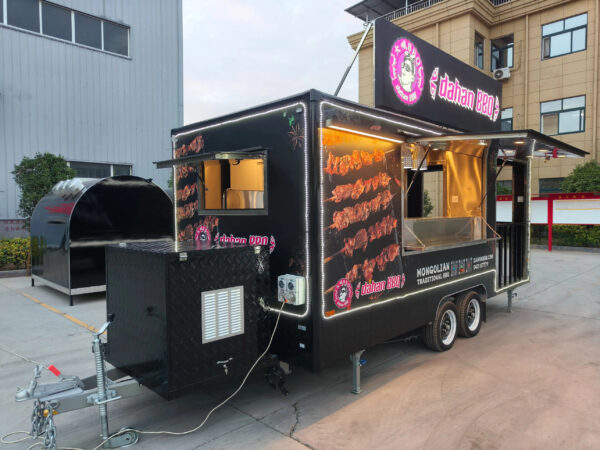 Rear exterior of a BBQ concession trailer for sale, showcasing access panels by Luxe Custom Co.