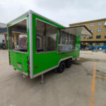 Rear exterior of a concession trailer for sale with LED signage, crafted by Luxe Custom Co food trailer builders.