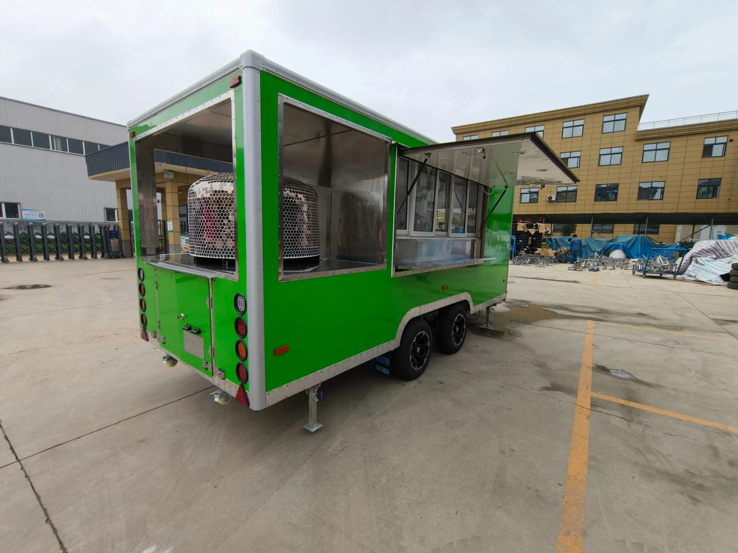 Rear exterior of a concession trailer for sale with LED signage, crafted by Luxe Custom Co food trailer builders.
