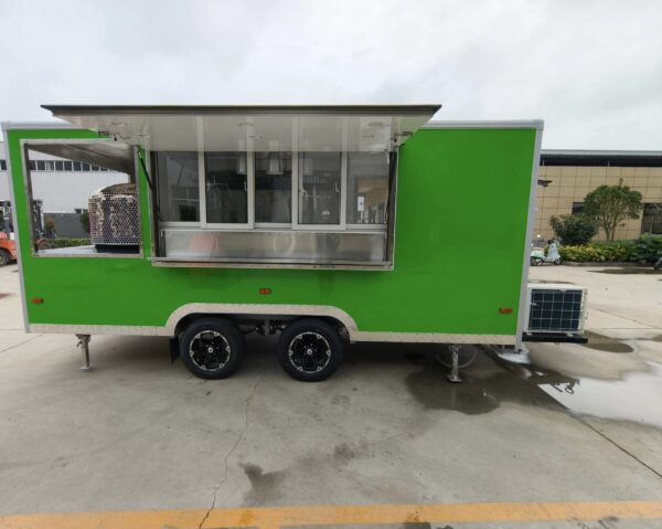 Vibrant exterior of a custom concession trailer with fruit-inspired wrap, crafted by Luxe Custom Co food trailer builders.