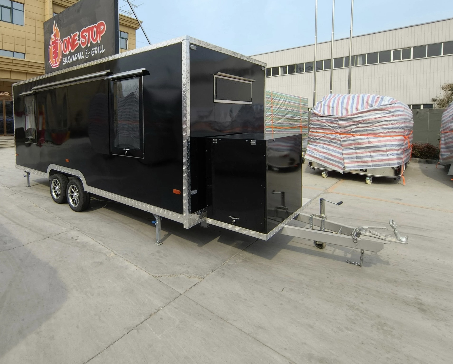 Right-side exterior of a mobile food trailer with custom design, crafted by Luxe Custom Co for food trailers for sale near me.
