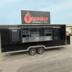 Left-side exterior of an 18ft square-body concession trailer for sale, built by Luxe Custom Co food trailer builders.