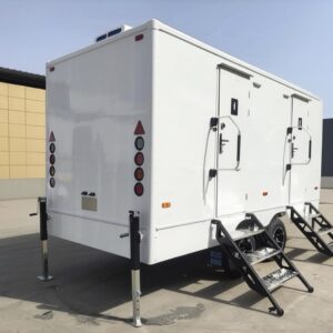Custom bathroom trailer exterior with vibrant wrap and durable design by Luxe Custom Co, expert custom trailer builders.