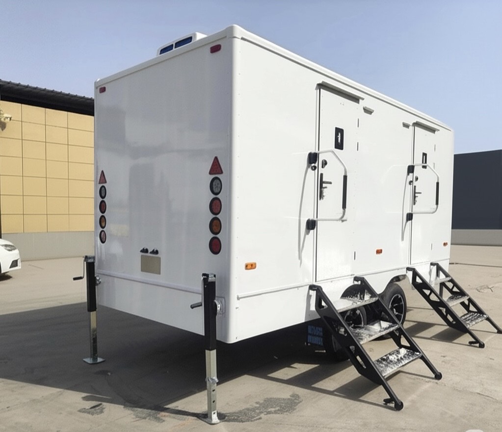 Custom bathroom trailer exterior with vibrant wrap and durable design by Luxe Custom Co, expert custom trailer builders.