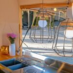 Serving window interior of a food truck trailer with ingredient compartments, built by Luxe Custom Co for sale near me.