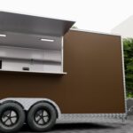 Side exterior of a brown food truck trailer with branded wrap, built by Luxe Custom Co for buy food trailer needs.