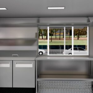 Interior of a custom food trailer with compact smoothie station and storage, built by Luxe Custom Co.