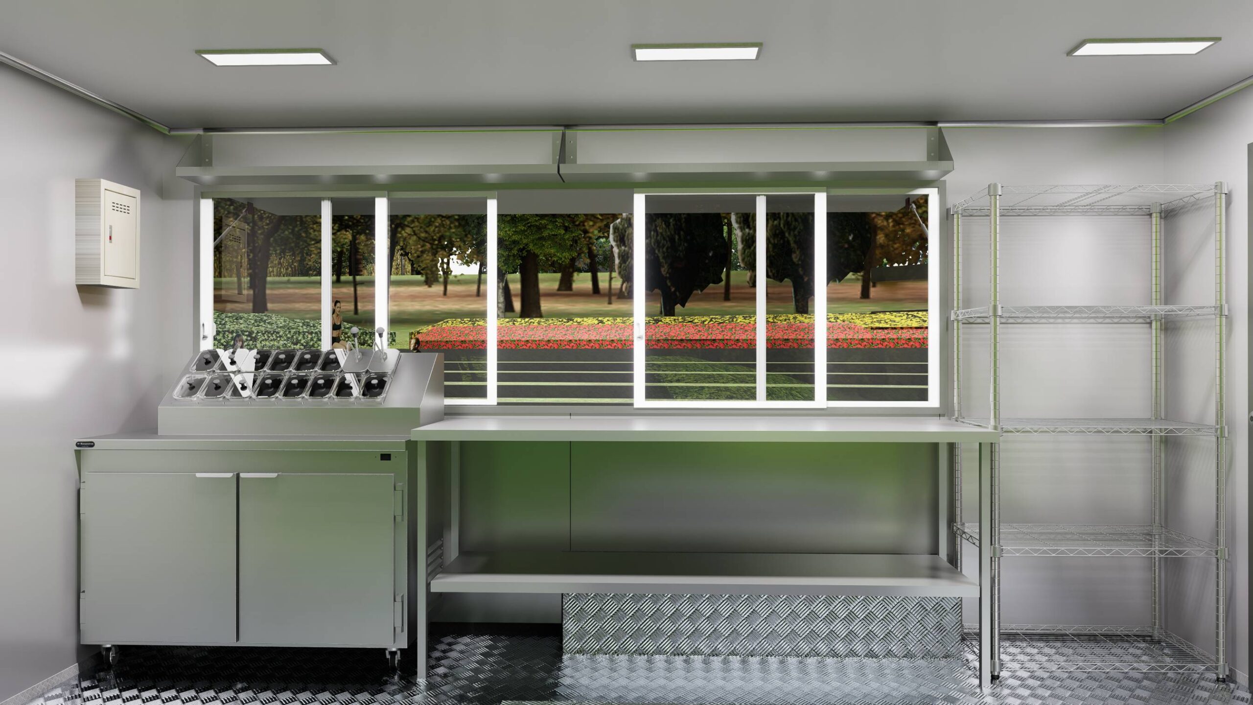 Interior of a mobile food trailer with stainless steel counters for ice cream prep, built by Luxe Custom Co.