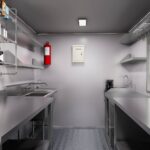 Interior of a mobile food trailer with ice cream equipment and hand sink, built by Luxe Custom Co for buy food trailer needs.
