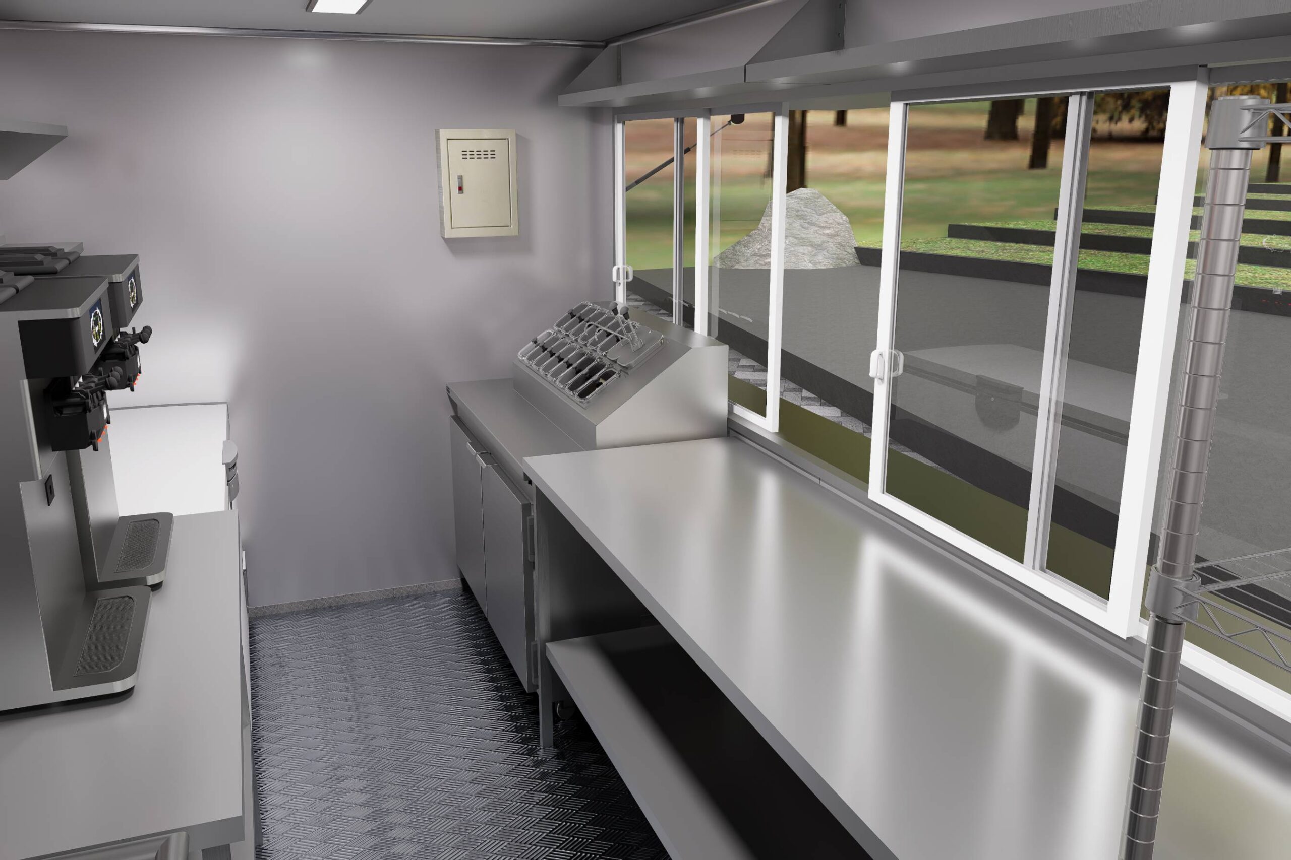Interior of a custom food trailer with stainless steel setup and ventilation for ice cream, crafted by Luxe Custom Co.