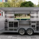 Interior of a custom concession trailer with stainless steel counters for ice cream, crafted by Luxe Custom Co.