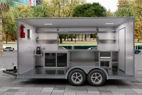 Interior of a custom concession trailer with stainless steel counters for ice cream, crafted by Luxe Custom Co.