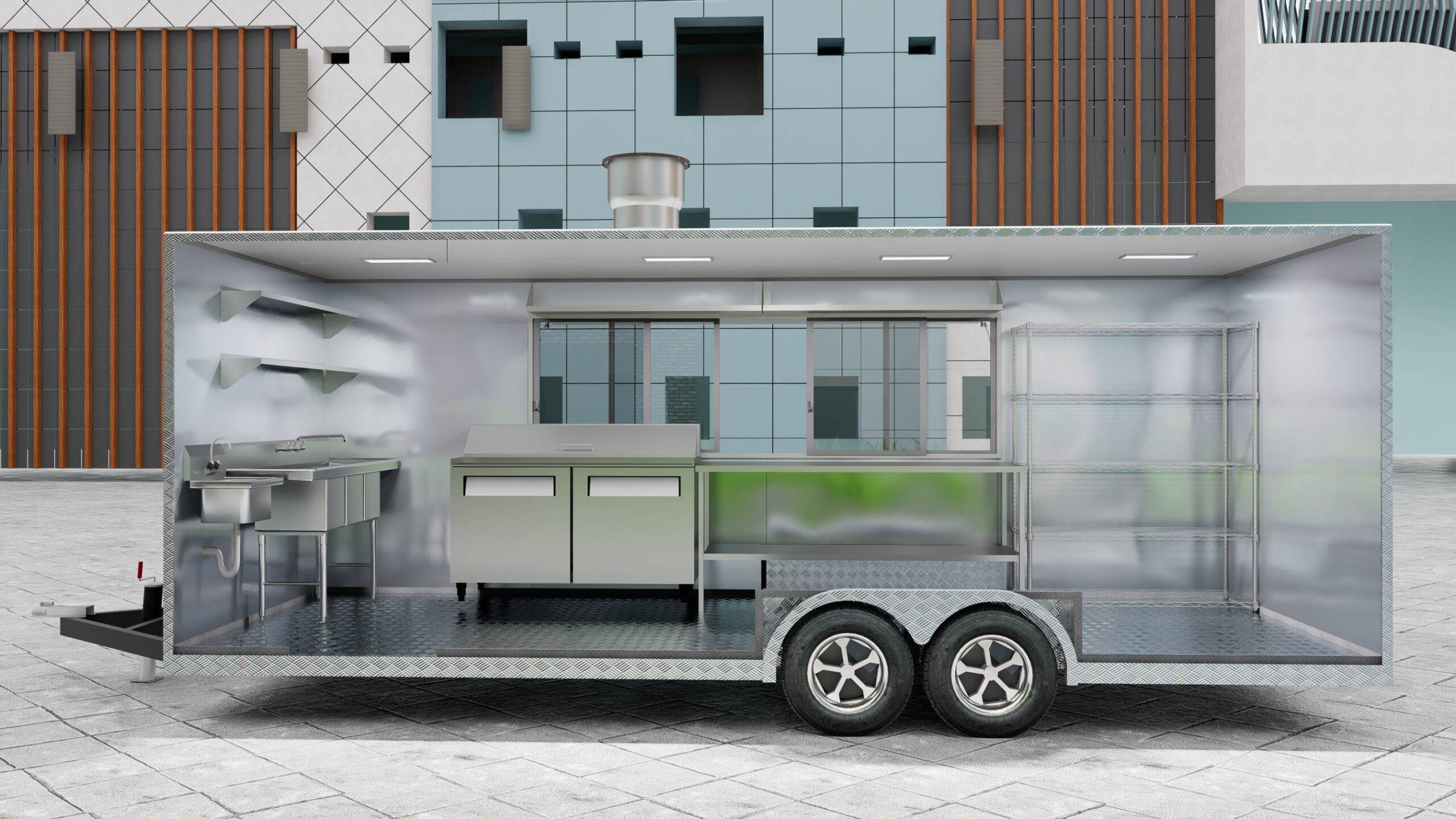 Interior of a food truck trailer with 3-compartment sink and freezer, built by Luxe Custom Co for buy food trailer needs.